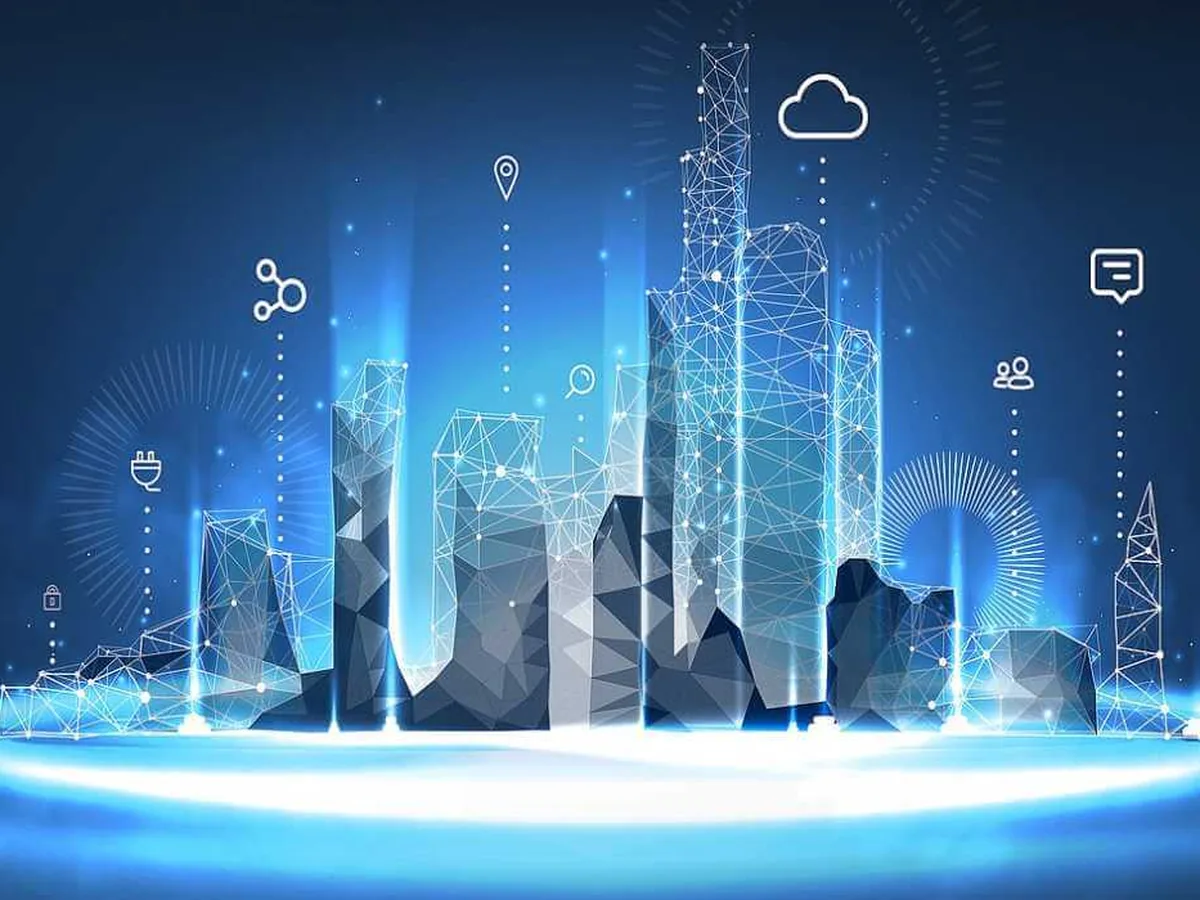 Stilisierte Stadt mit Cloud-Symbol als Sinnbild für vernetzte Standorte